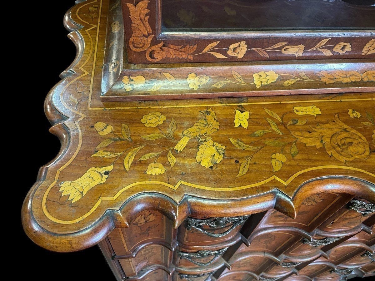 Elegant marquetry display case late 18th century early 19th century Display case in 2 parts with 1 showcase door at the top and 4 curved drawers underneath Furniture in good condition with normal signs of use