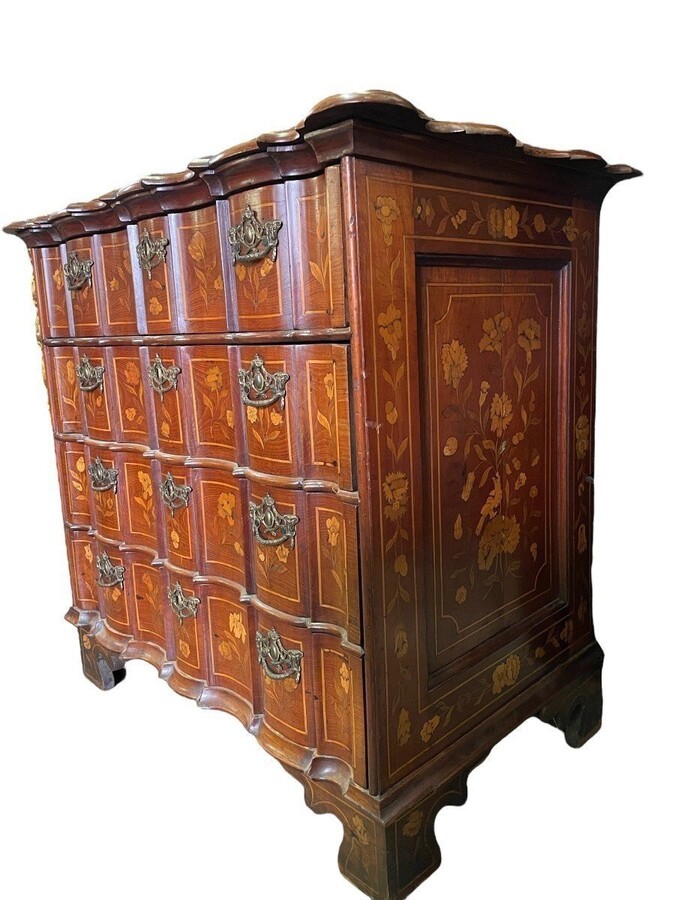 Elegant marquetry display case late 18th century early 19th century Display case in 2 parts with 1 showcase door at the top and 4 curved drawers underneath Furniture in good condition with normal signs of use