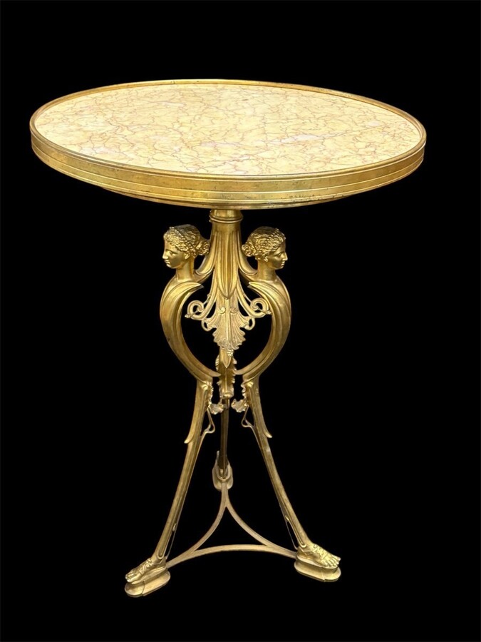 Gilded bronze pedestal table signed F. Barbedienne, 19th century. A rare, high-quality pedestal table decorated with three female figures on a base and featuring a coloured marble top. The table is signed by F. Barbedienne on the base.