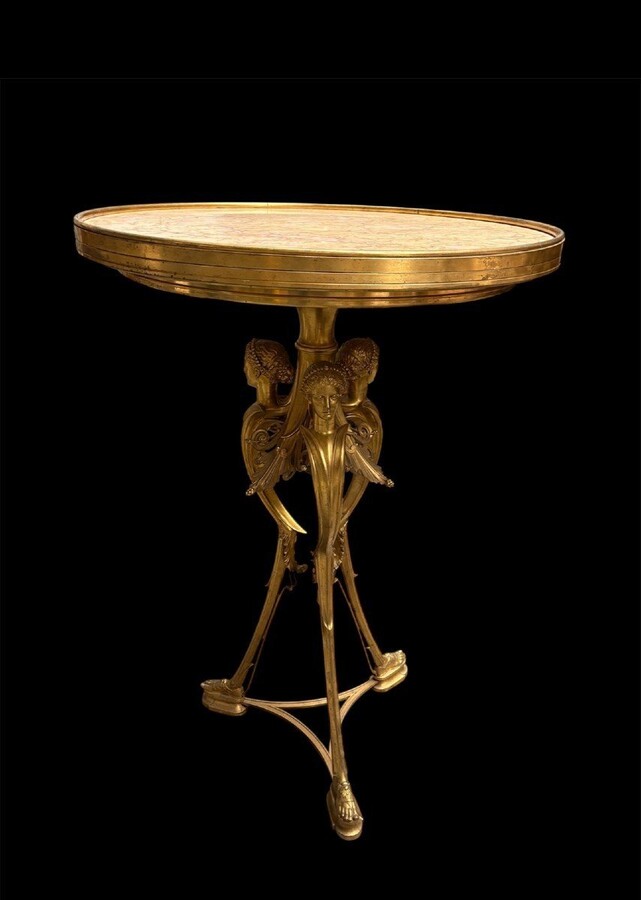 Gilded bronze pedestal table signed F. Barbedienne, 19th century. A rare, high-quality pedestal table decorated with three female figures on a base and featuring a coloured marble top. The table is signed by F. Barbedienne on the base.