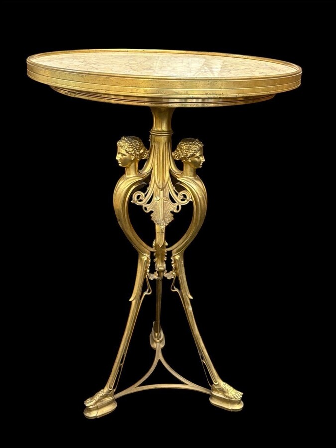 Gilded bronze pedestal table signed F. Barbedienne, 19th century. A rare, high-quality pedestal table decorated with three female figures on a base and featuring a coloured marble top. The table is signed by F. Barbedienne on the base.