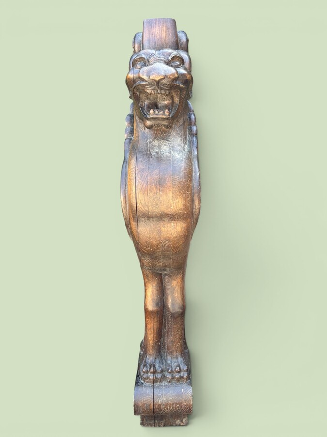 Large (127 cm) Empire-style ‘winged panther’ sculpture in oak, late 19th century. A highly decorative sculpture depicting a winged panther with ornamental details, suitable for use as a staircase finial, a large lamp base, etc. 