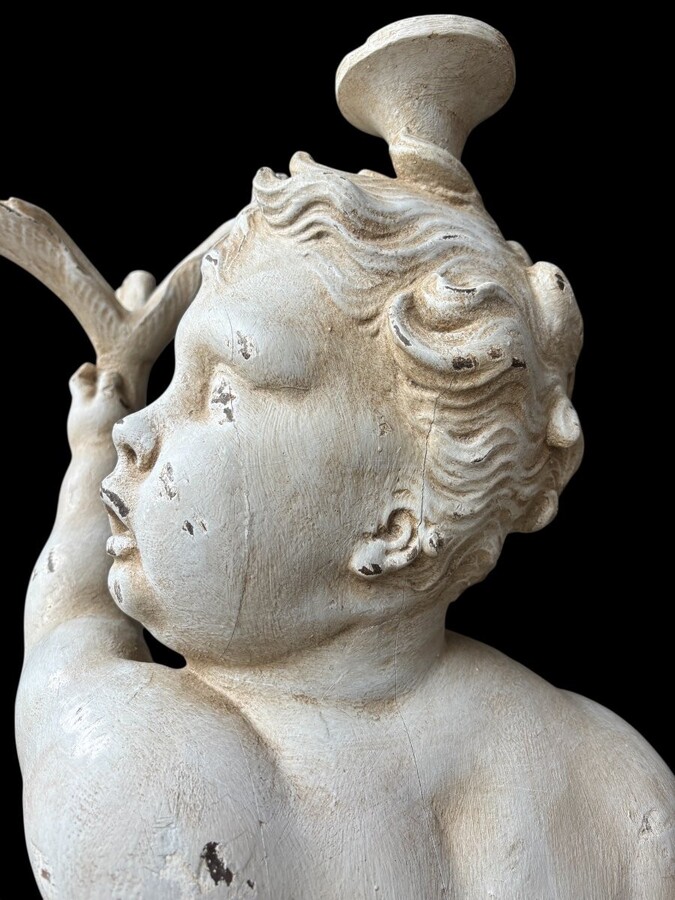 Large 18thC. painted wood sculpture of a putti. ( 92 cm ) Very decorative wooden sculpture representing a large putti with a shell in his hand, sitting on a cushion. The sculpture can be used as a table or pedestal if a glass or marble top is used.