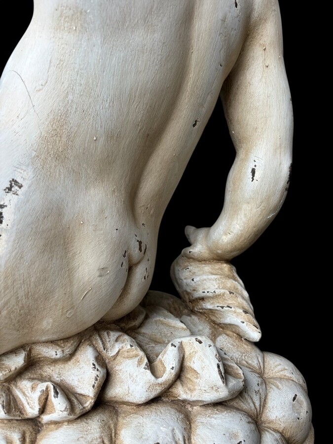 Large 18thC. painted wood sculpture of a putti. ( 92 cm ) Very decorative wooden sculpture representing a large putti with a shell in his hand, sitting on a cushion. The sculpture can be used as a table or pedestal if a glass or marble top is used.