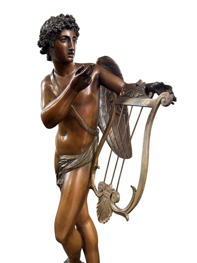 Large 19th century bronze ‘angel with lyre’ sculpture. Decorative sculpture representing an angel with a lyre on a coloured marble base. Marble base: 25 x 25 cm , 8 cm high. In good condition.