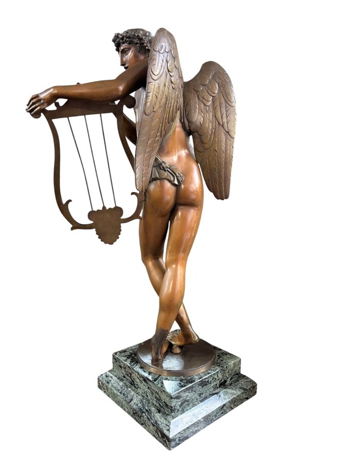 Large 19th century bronze ‘angel with lyre’ sculpture. Decorative sculpture representing an angel with a lyre on a coloured marble base. Marble base: 25 x 25 cm , 8 cm high. In good condition.