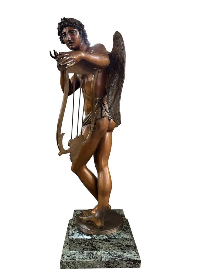 Large 19th century bronze ‘angel with lyre’ sculpture. Decorative sculpture representing an angel with a lyre on a coloured marble base. Marble base: 25 x 25 cm , 8 cm high. In good condition.