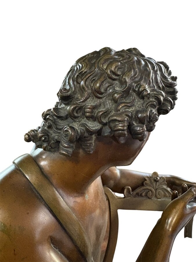 Large 19th century bronze ‘angel with lyre’ sculpture. Decorative sculpture representing an angel with a lyre on a coloured marble base. Marble base: 25 x 25 cm , 8 cm high. In good condition.