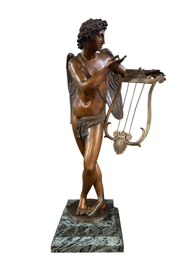Large 19th century bronze ‘angel with lyre’ sculpture. Decorative sculpture representing an angel with a lyre on a coloured marble base. Marble base: 25 x 25 cm , 8 cm high. In good condition.