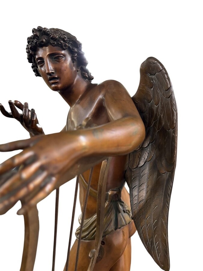 Large 19th century bronze ‘angel with lyre’ sculpture. Decorative sculpture representing an angel with a lyre on a coloured marble base. Marble base: 25 x 25 cm , 8 cm high. In good condition.