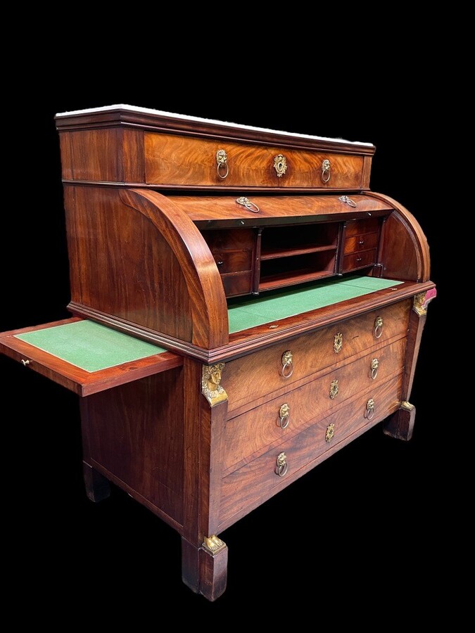 Large 19th century Empire mahogany and gilt bronze cylinder desk. Beautiful desk d'epoque Empire in used condition and could use some restoration to the legs. Desk has a white marble top and is fitted with 2 45 cm extensions on the left and right.