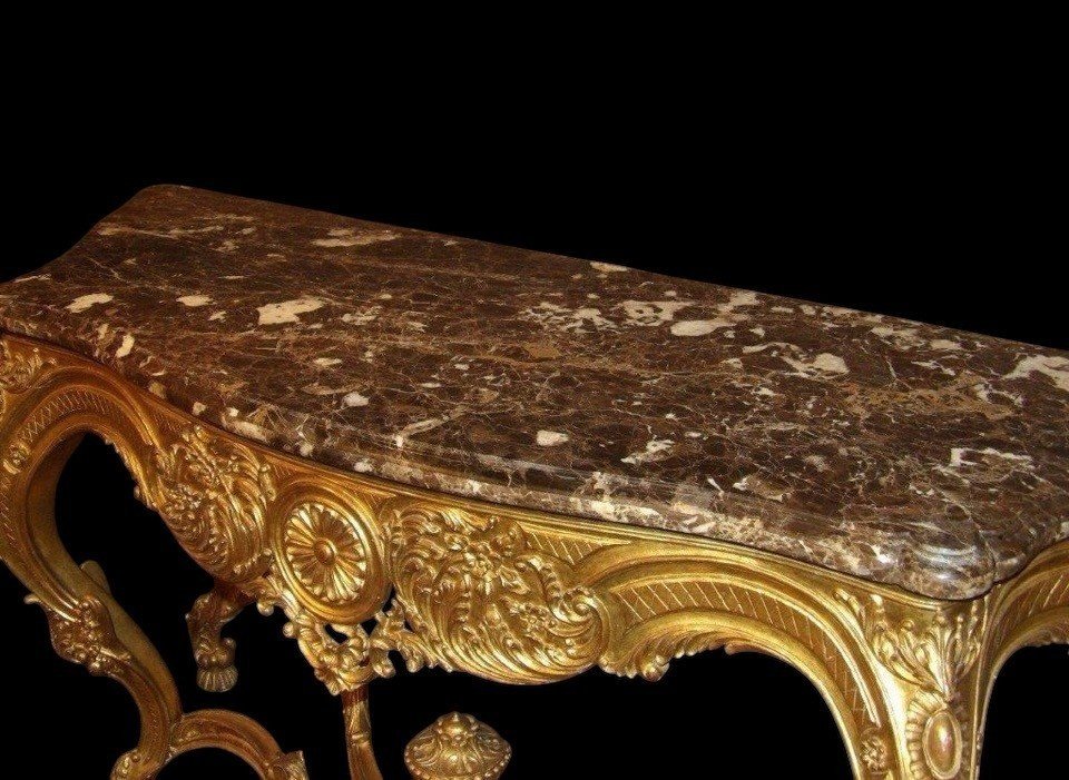 Large 4-foot console Louis XV style in gilded wood 19th century Beautiful large console with original gilding and 4 cm thick marble top. Marble in very good condition , base in wood has some old restorations on the legs. Dimensions : Width : 191 cm