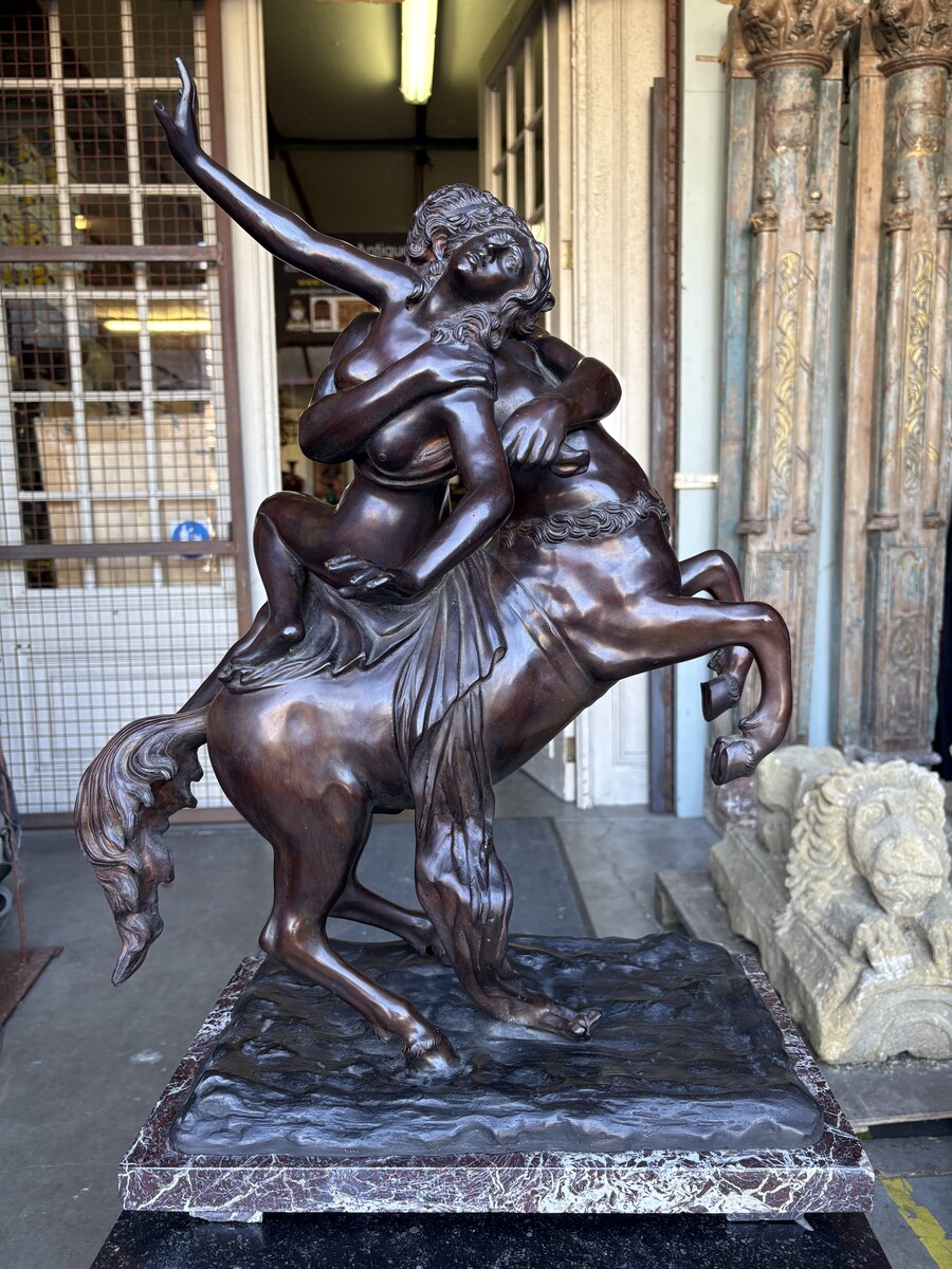 Large bronze sculpture, ‘Nessus Abducting Deianira’, Greek mythology, 20thC. A nice bronze sculpture depicting the centaur Nessus abducting Deianira, the wife of Heracles. The bronze sculpture is mounted on a marble plinth. 