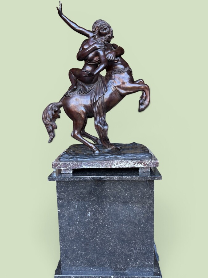 Large bronze sculpture, ‘Nessus Abducting Deianira’, Greek mythology, 20thC. A nice bronze sculpture depicting the centaur Nessus abducting Deianira, the wife of Heracles. The bronze sculpture is mounted on a marble plinth. 
