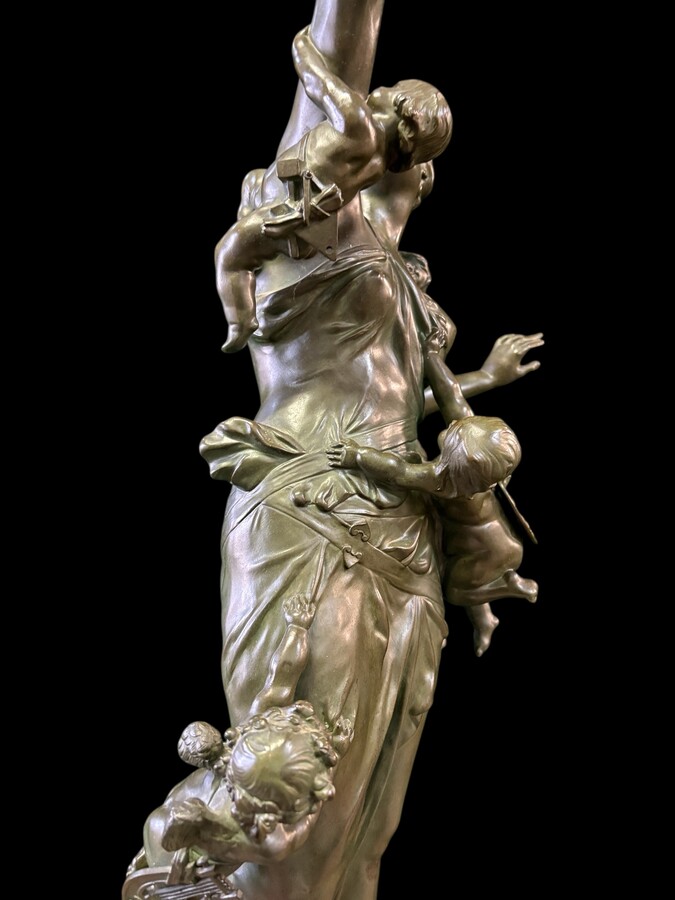 Large bronze sculpture signed by De Wever entitled ‘Nothing comes without effort’.  A lady with five putti, allegories of the arts (sculpture, music, painting, architecture and literature