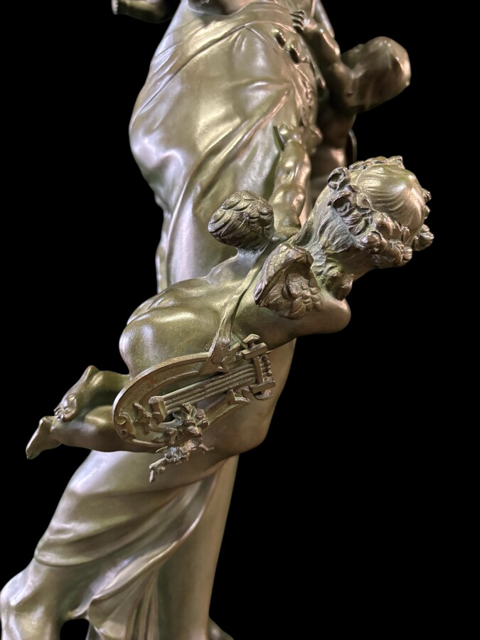 Large bronze sculpture signed by De Wever entitled ‘Nothing comes without effort’.  A lady with five putti, allegories of the arts (sculpture, music, painting, architecture and literature