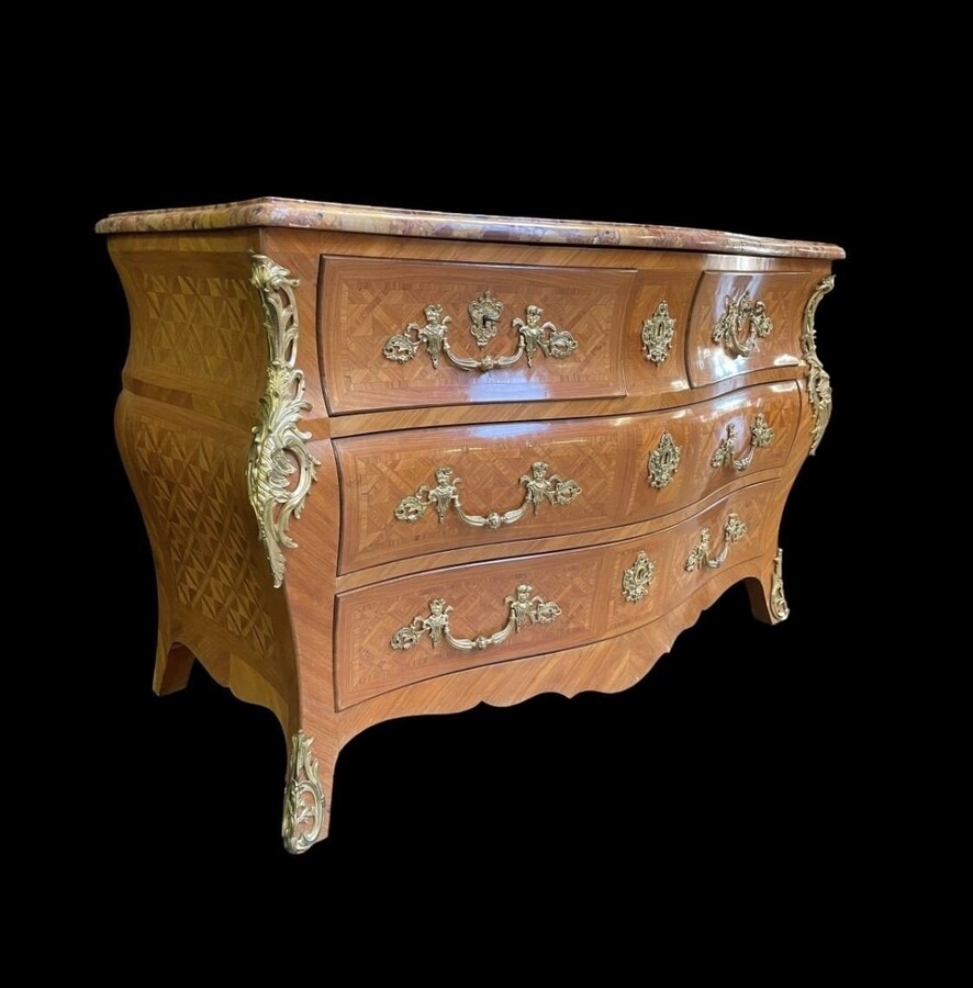 Large commode in Louis XV style 19thC. Dresser with parquet veneer, gilt bronze ornaments and fitted with 2 small drawers at the top and 2 large ones below. At the top a beautiful Plateau en Marbre Breche d'Alep. Dimensions : Width : 139 cm