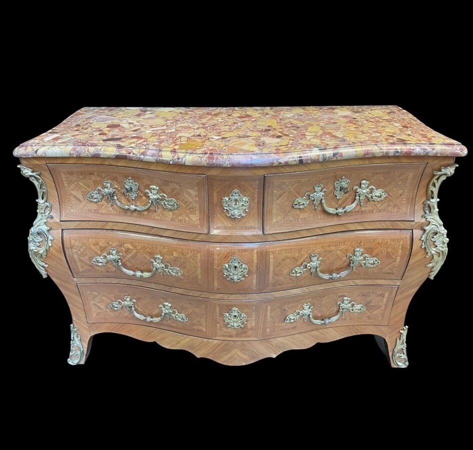 Large commode in Louis XV style 19thC. Dresser with parquet veneer, gilt bronze ornaments and fitted with 2 small drawers at the top and 2 large ones below. At the top a beautiful Plateau en Marbre Breche d'Alep. Dimensions : Width : 139 cm