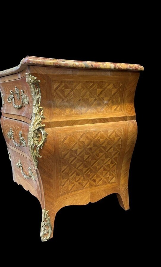 Large commode in Louis XV style 19thC. Dresser with parquet veneer, gilt bronze ornaments and fitted with 2 small drawers at the top and 2 large ones below. At the top a beautiful Plateau en Marbre Breche d'Alep. Dimensions : Width : 139 cm