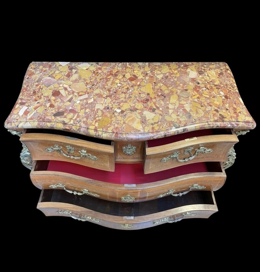 Large commode in Louis XV style 19thC. Dresser with parquet veneer, gilt bronze ornaments and fitted with 2 small drawers at the top and 2 large ones below. At the top a beautiful Plateau en Marbre Breche d'Alep. Dimensions : Width : 139 cm