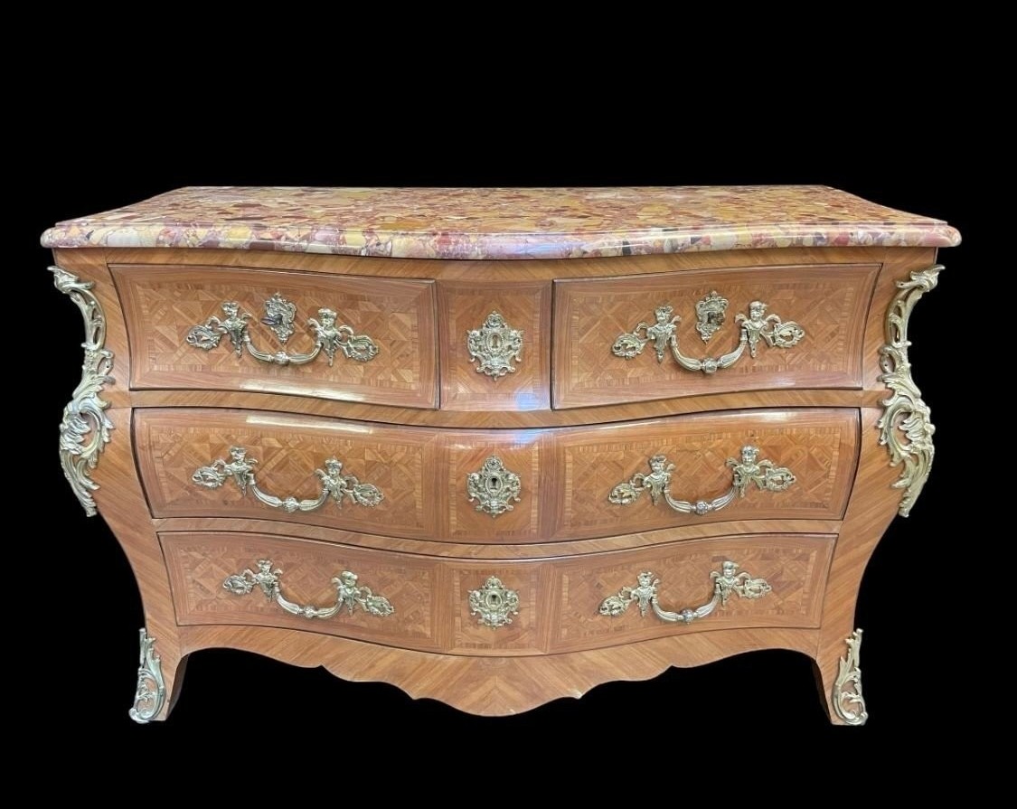 Large commode in Louis XV style 19thC. Dresser with parquet veneer, gilt bronze ornaments and fitted with 2 small drawers at the top and 2 large ones below. At the top a beautiful Plateau en Marbre Breche d'Alep. Dimensions : Width : 139 cm