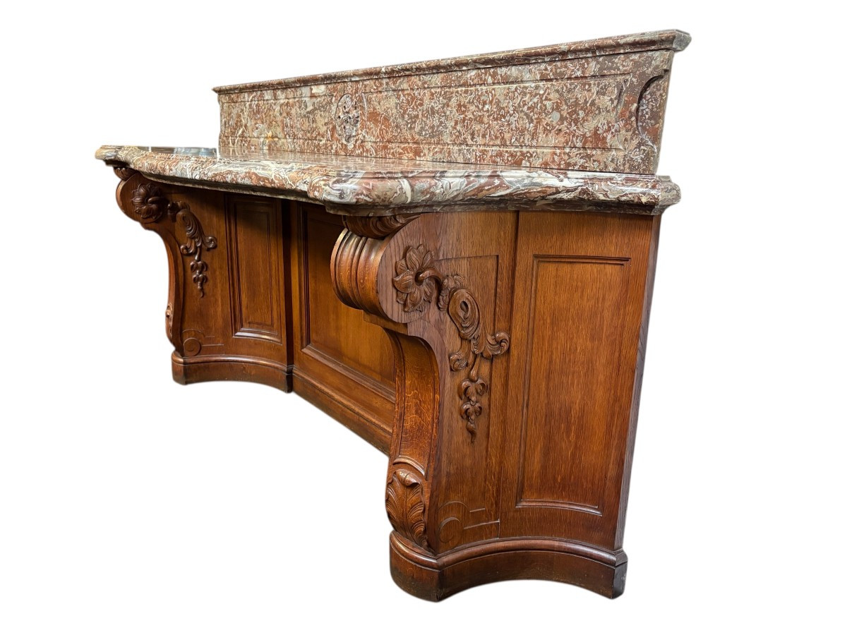 Large curved oak console table with beautiful marble top, 19th century. High-quality oak console table/wall unit, finely carved, with a magnificent 7 cm thick ‘Rouge Griotte’ marble top. Dimension: Width: 230 cm