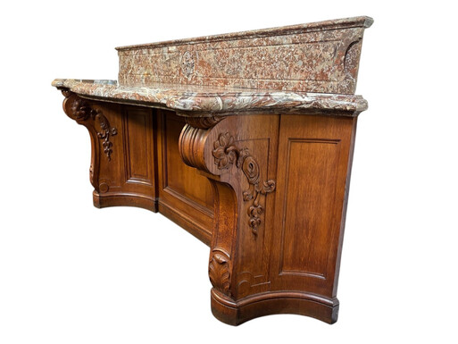 Large curved oak console table with beautiful marble top, 19th century. High-quality oak console table/wall unit, finely carved, with a magnificent 7 cm thick ‘Rouge Griotte’ marble top. Dimension: Width: 230 cm