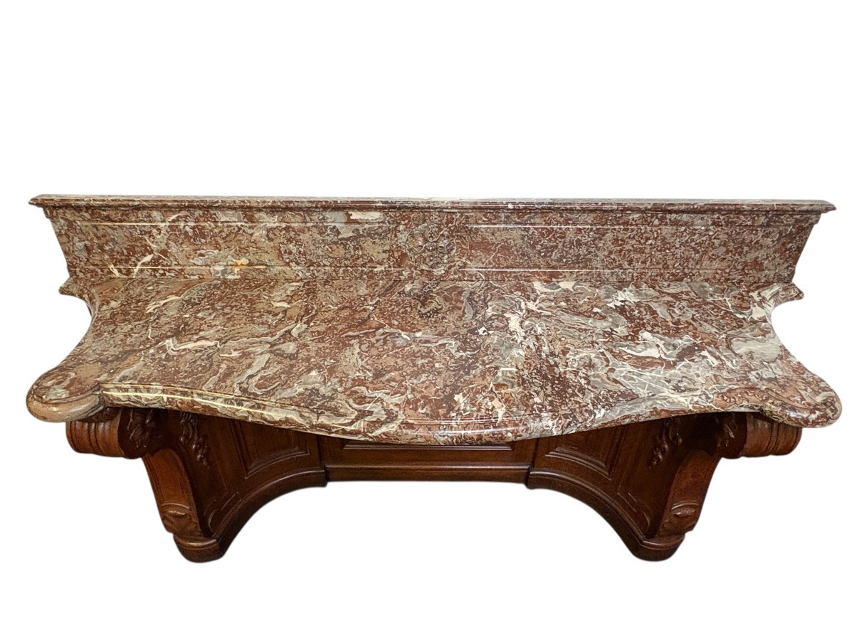 Large curved oak console table with beautiful marble top, 19th century. High-quality oak console table/wall unit, finely carved, with a magnificent 7 cm thick ‘Rouge Griotte’ marble top. Dimension: Width: 230 cm