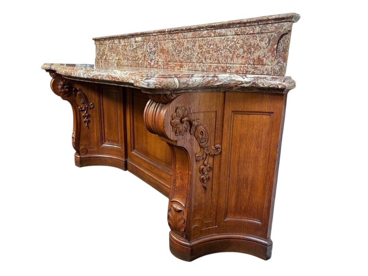 Large curved oak console table with beautiful marble top, 19th century. High-quality oak console table/wall unit, finely carved, with a magnificent 7 cm thick ‘Rouge Griotte’ marble top. Dimension: Width: 230 cm