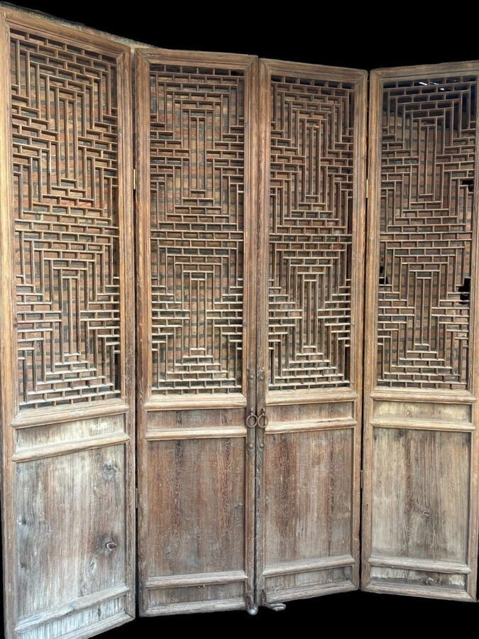 Large , decorative 4-piece door in solid wood 19thC. The doors have openwork panels at the top and closed panels at the bottom and have their original wrought iron fittings and a beautiful natural patina Dimensions : Height : 278 cm Total width : 240 cm
