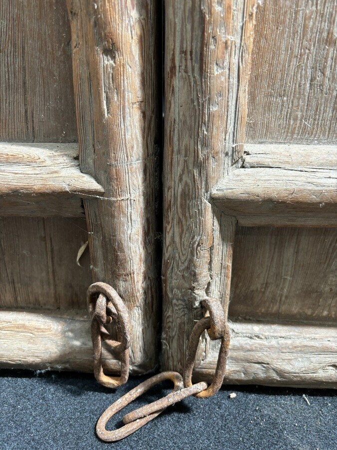 Large , decorative 4-piece door in solid wood 19thC. The doors have openwork panels at the top and closed panels at the bottom and have their original wrought iron fittings and a beautiful natural patina Dimensions : Height : 278 cm Total width : 240 cm
