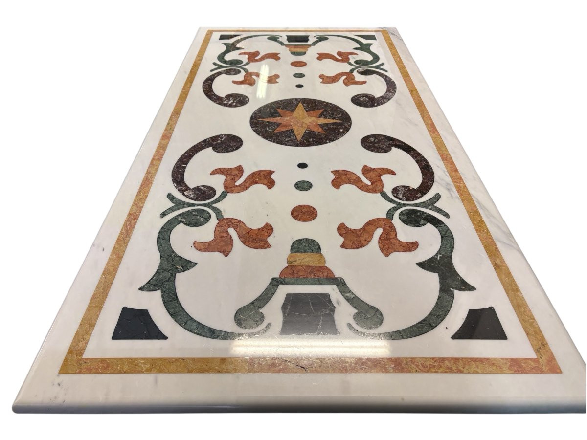 Large decorative table with inlaid marble top, 20th century. A beautiful table with a wrought iron base and a marble top inlaid with various types and colors of marble, with a large star in the center. Dimensions: 200 x 100 x 74 cm