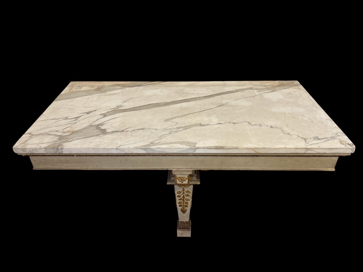 Large Empire console table with mirror, 1800–1820 (282.5 cm) Large console table with an original Empire-period mirror The console table and mirror are made of painted wood, adorned with caryatids, gilded woodwork and decorative elements.