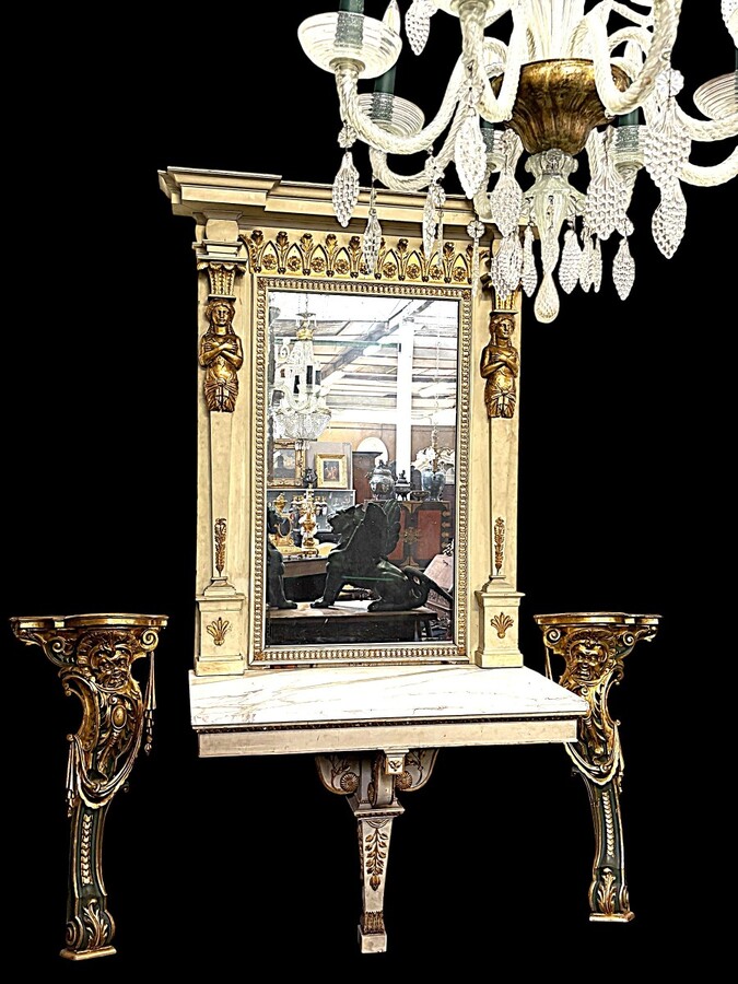 Large Empire console table with mirror, 1800–1820 (282.5 cm) Large console table with an original Empire-period mirror The console table and mirror are made of painted wood, adorned with caryatids, gilded woodwork and decorative elements.