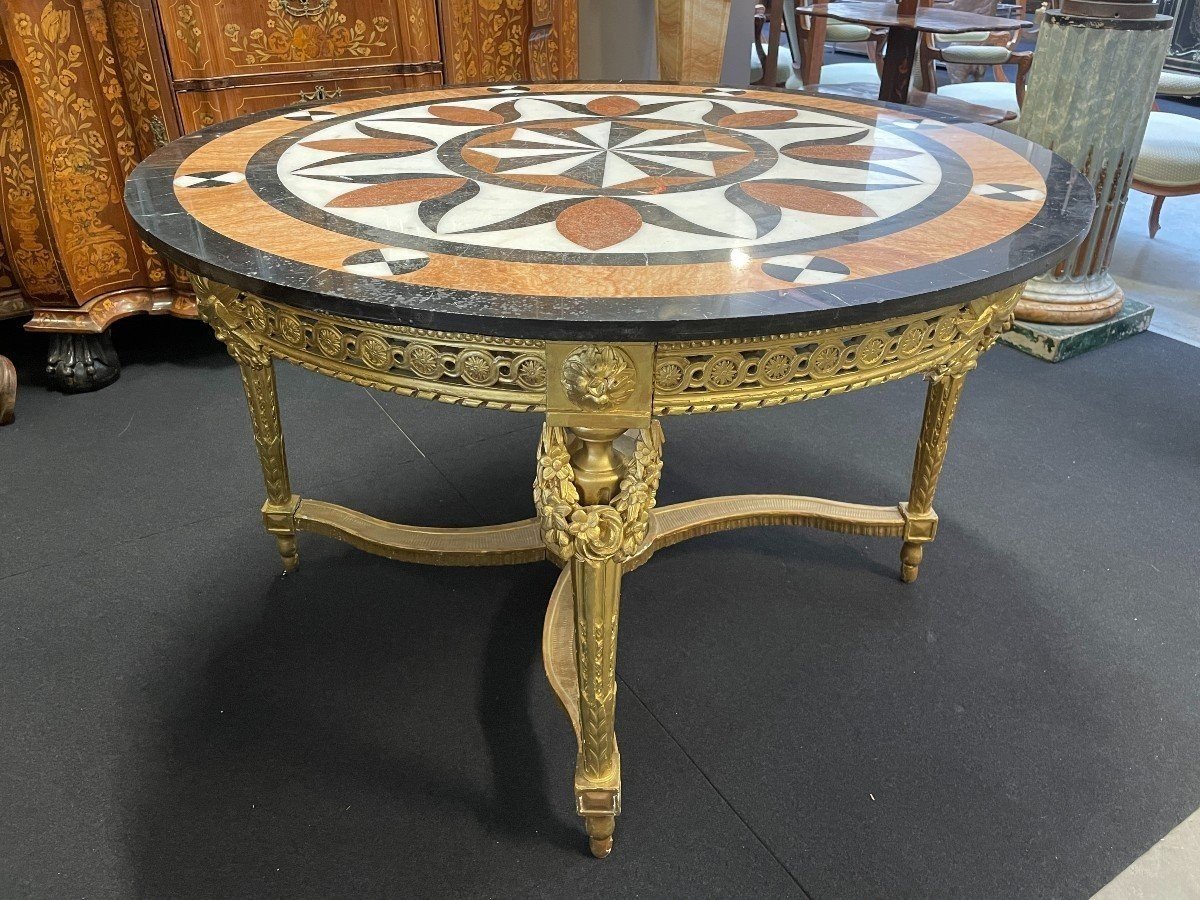 Large Gilded Wood Center Table / Quéridon With inlaid Marble Top In The Louis XVI Style From The Napoleon III Period. Nice Model All Carved Wood In Good Condition, No Original Gilding. Dimensions : Diameter : 120 Cm Height : 75 Cm