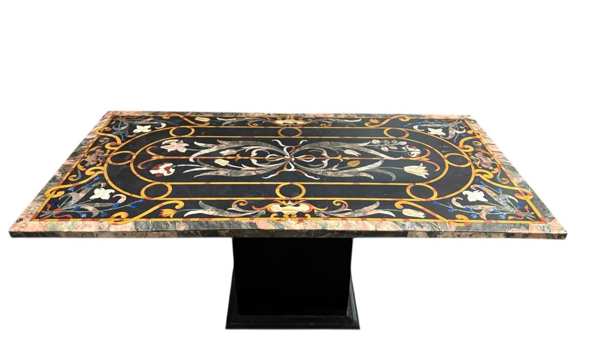 Large Italian marble table with coloured semi-precious stones, 20thC ( 181 x 91 x 78 cm ) Nice 3 cm thick top inlaid with semi-precious stones forming a floral pattern, resting on a black marble base. Highly decorative marble table