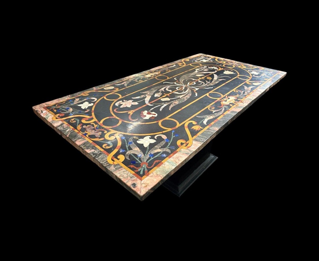 Large Italian marble table with coloured semi-precious stones, 20thC ( 181 x 91 x 78 cm ) Nice 3 cm thick top inlaid with semi-precious stones forming a floral pattern, resting on a black marble base. Highly decorative marble table