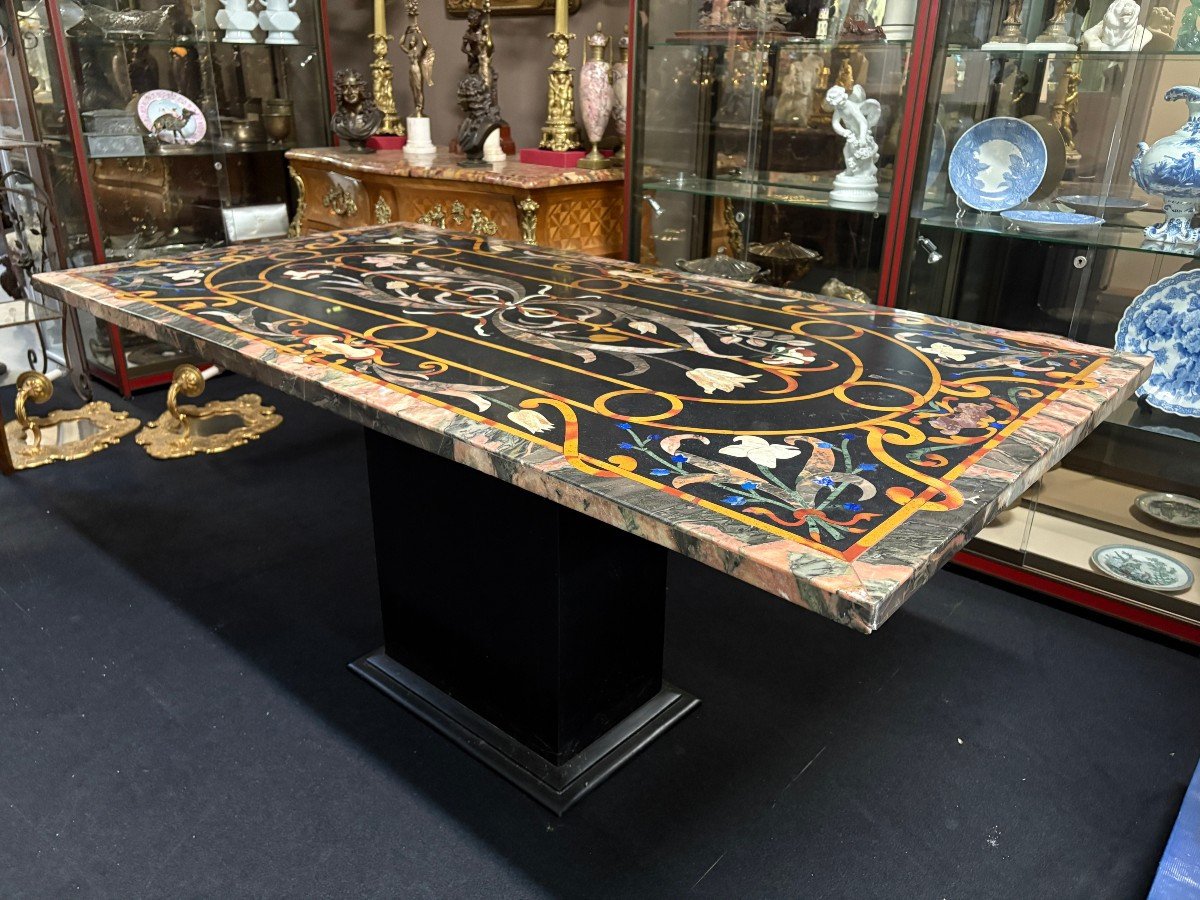 Large Italian marble table with coloured semi-precious stones, 20thC ( 181 x 91 x 78 cm ) Nice 3 cm thick top inlaid with semi-precious stones forming a floral pattern, resting on a black marble base. Highly decorative marble table