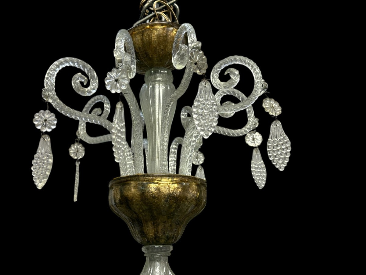 Large Liège chandelier with 8 arms, 19th century (112 cm). Beautiful decorative glass chandelier with 8 large arms featuring light points decorated with small and large scrolls adorned with glass balls, grape cluster-shaped nuggets