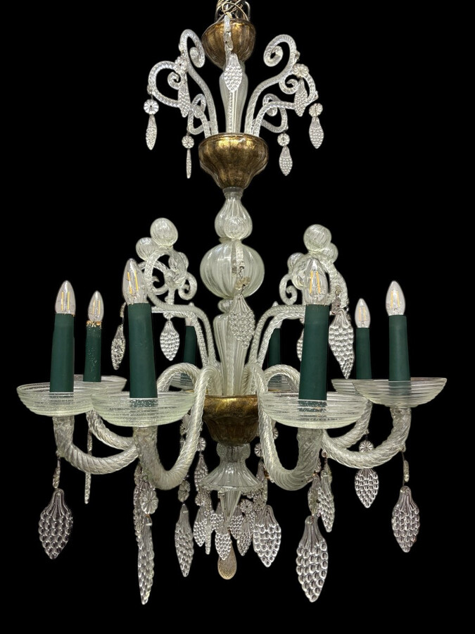 Large Liège chandelier with 8 arms, 19th century (112 cm). Beautiful decorative glass chandelier with 8 large arms featuring light points decorated with small and large scrolls adorned with glass balls, grape cluster-shaped nuggets