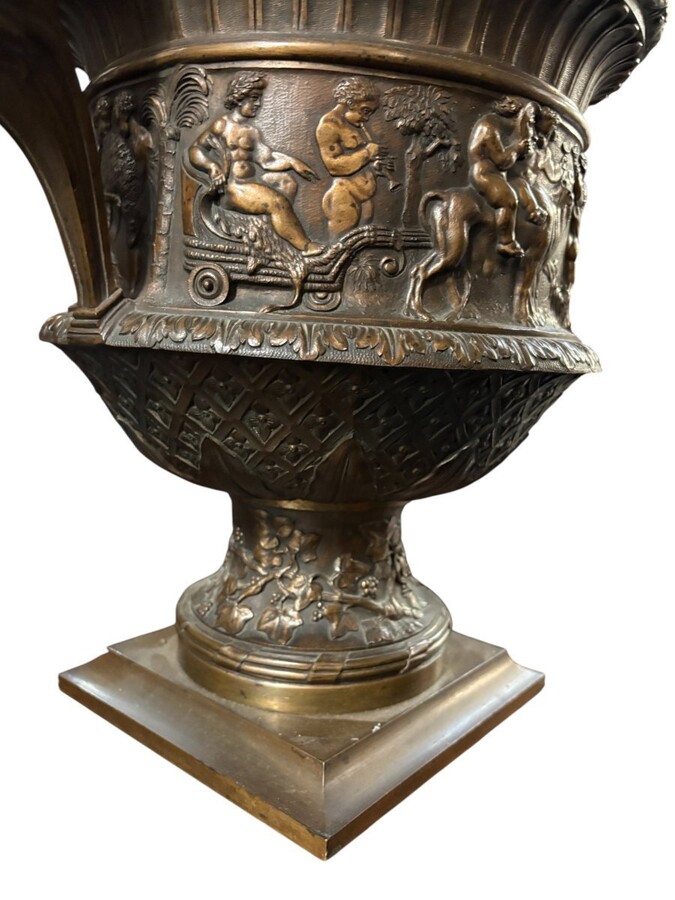 Large ‘Medici’ vase in brown patinated bronze with a procession of Bacchus, 19th century. Decorative vase decorated with a Bacchanalian procession and fitted with handles in the shape of mythological ladies.