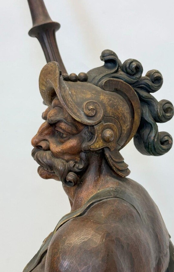 Large polychrome oak sculpture of a soldier/warrior late 19th century Very decorative and detailed carving of a warrior with shield and spear. In very good condition. Dimensions : Height : 109 / 134 cm Width : 49 cm Depth : 39 cm Foot : 26 x 21,5 cm