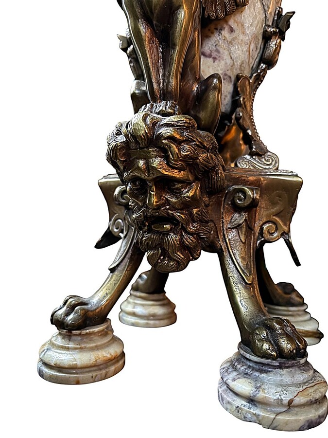 ‘Mythological Sphinx’ lamp base in bronze/marble, 1920. Decorative lamp base depicting two mythological sphinxes in bronze standing on a bearded man's head leaning against a large marble vase. Small defect