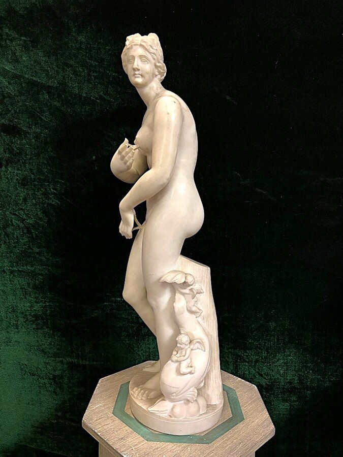 Nice alabaster sculpture from the 19th century. ( 79 cm ) Beautiful alabaster sculpture finely detailed representing Venus with a fish and 2 angels playing. Signed on the base at the back Dimensions : Height : 79 cm Width : 26 cm Foot diameter : 21 cm
