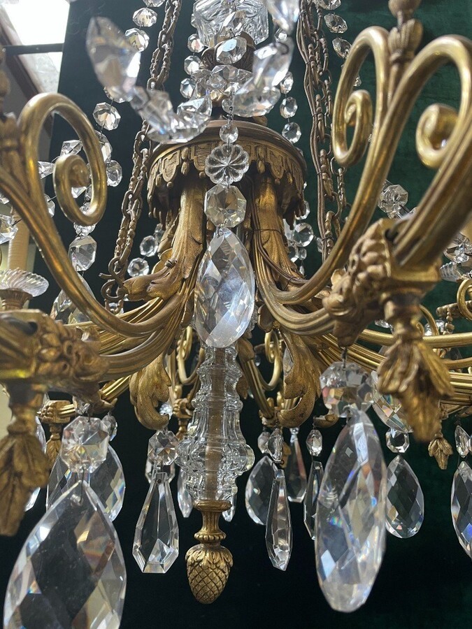 Nice, Late 19th Century LXVI Style Bronze/Crystal Chandelier. Bronze Frame Decorated With 10 Arms/Luminous Points, Bronze Decorative Elements, A Crystal Spike At The Top And Numerous Crystal Spokes. Dimensions: Height : 106 Cm Width : 80 Cm