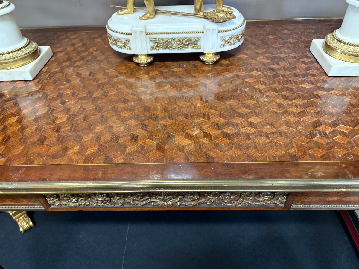Nice Louis XVI style coffee table/desk after Jean-Henri Riesener, 19th century. High-quality desk with parquet top, equipped with a large drawer and decorated with very refined bronze decorations and ornaments.