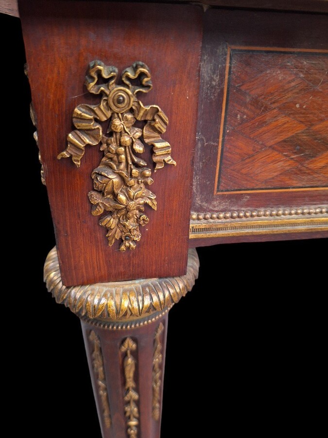 Nice Louis XVI style coffee table/desk after Jean-Henri Riesener, 19th century. High-quality desk with parquet top, equipped with a large drawer and decorated with very refined bronze decorations and ornaments.