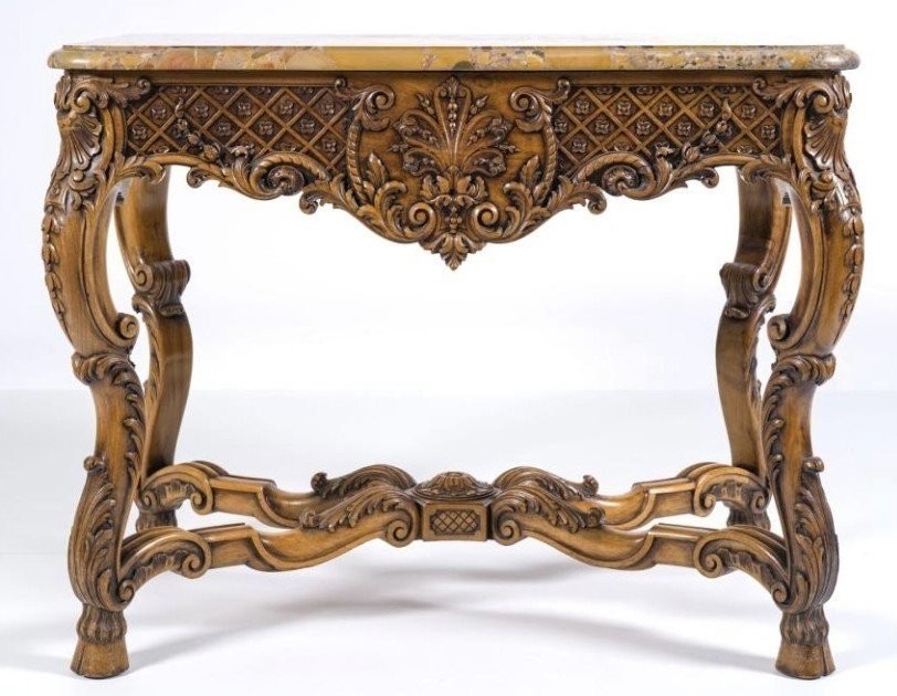 Ornately carved wooden coffee table with a marble top, circa 1920. Attractive oak coffee table/console with a Breche d'Aleppo marble top. Dimensions: Height: 80 cm. Width: 100 cm. Depth: 60 cm. In very good condition.