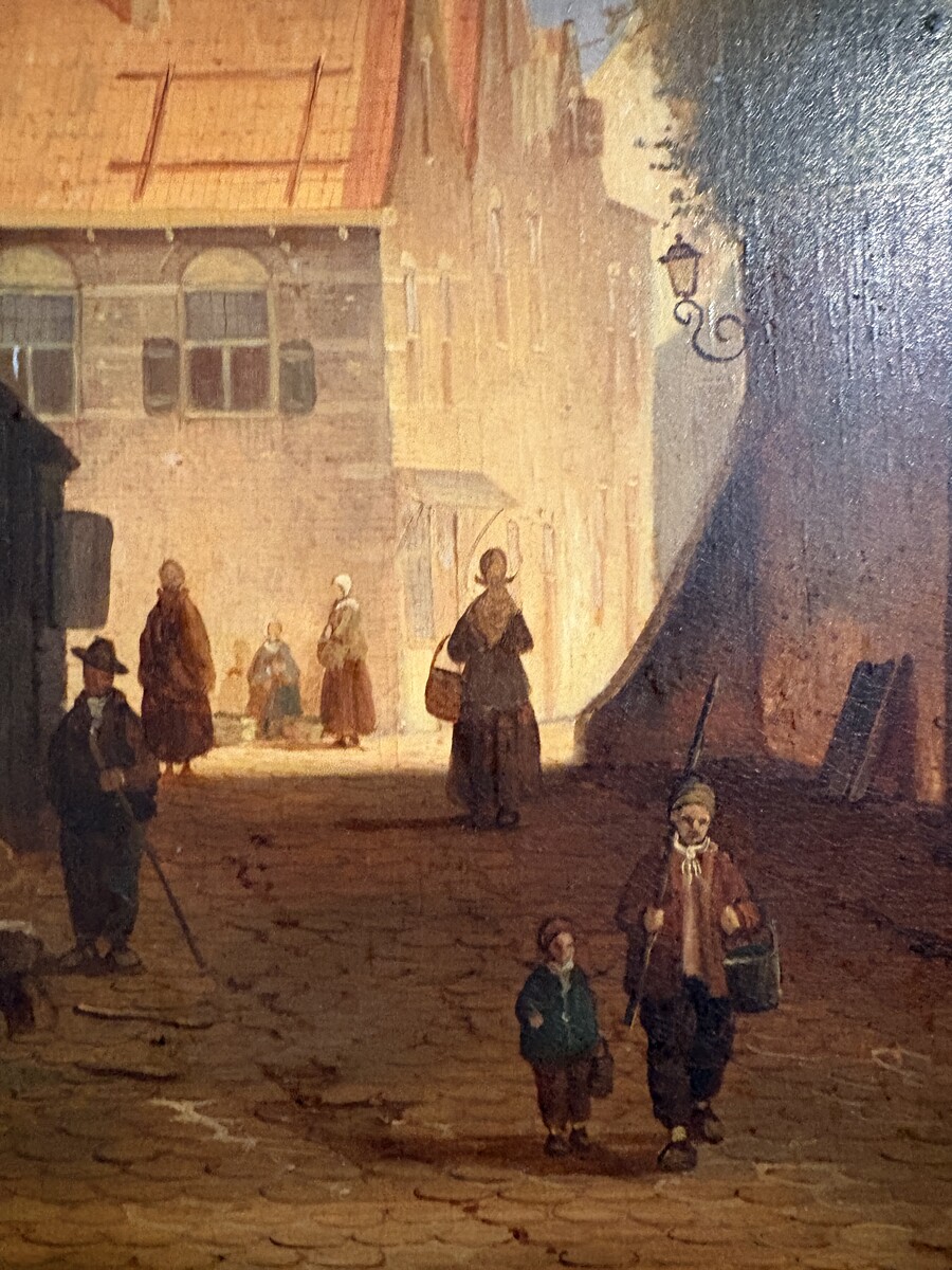 Painting ‘View of an Old Dutch Town’ oil on panel, 19th century Decorative painting in a large gilded frame depicting an old town, a street with old houses, a church, a gate with a municipal garden and various figures. 