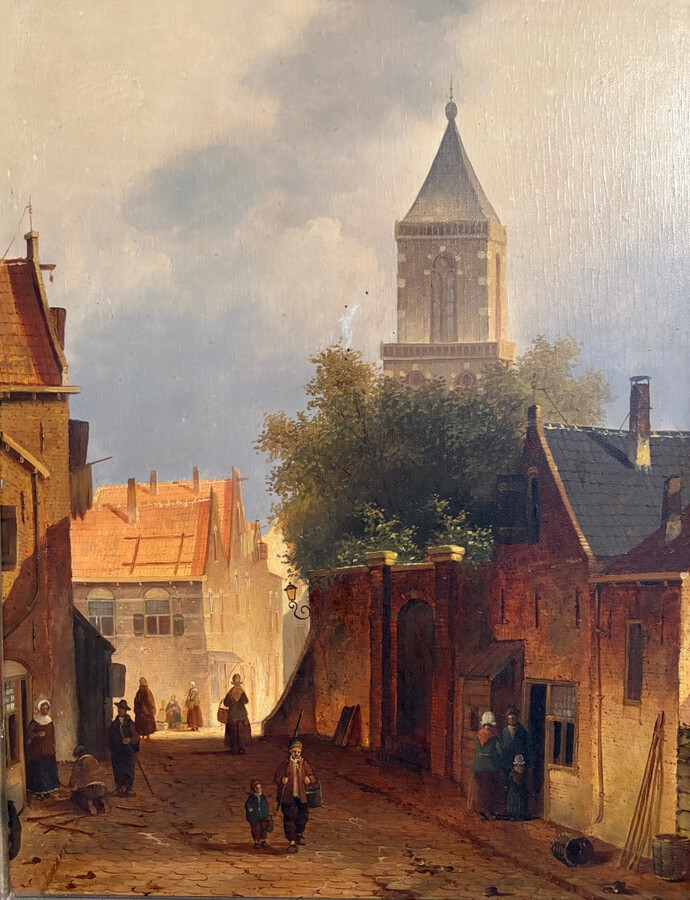 Painting ‘View of an Old Dutch Town’ oil on panel, 19th century Decorative painting in a large gilded frame depicting an old town, a street with old houses, a church, a gate with a municipal garden and various figures.